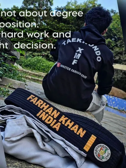 A motivational image of my black belt and uniform, with a quote about hard work and right decisions.