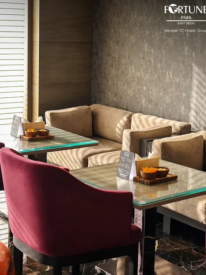 The comfortable lounge seating at Neptune, perfect for small groups looking for a semi-private space to chat and enjoy drinks.