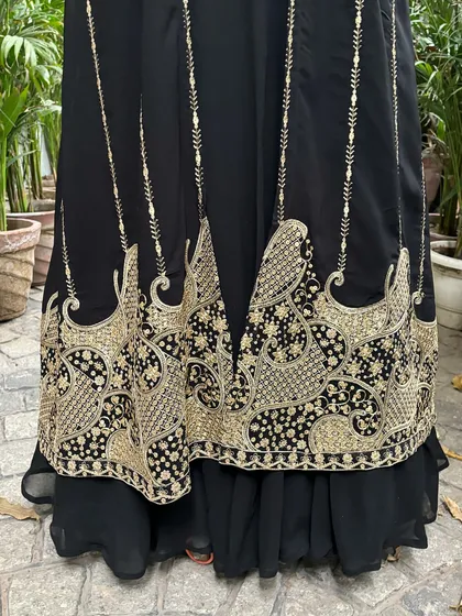 The hem of the jacket features a beautiful, intricate border design.