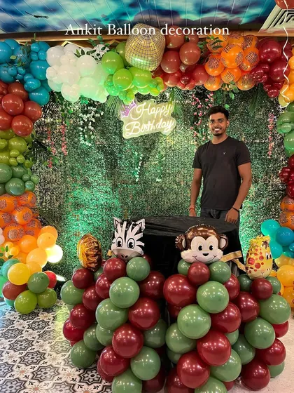 Here I am with the completed jungle theme setup. I love seeing a creative vision come to life.