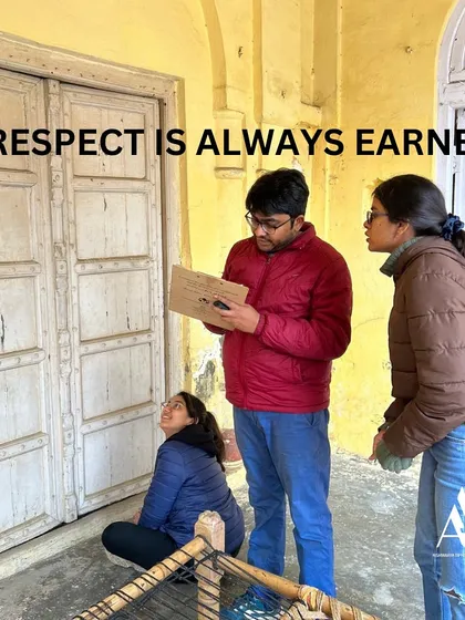 Mentorship in action. Our Studio Manager, who has been with us for over a decade, is seen here guiding junior team members on site. We believe in earning respect through dedicated work and fostering growth within our team.