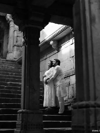 A wide shot showing the scale and beauty of an architectural location. This black and white photo feels both grand and incredibly intimate.