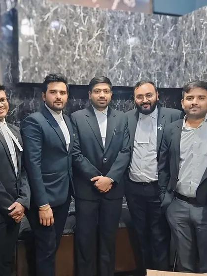With my team of advocates, who are active in Saket and Karkardooma district courts.