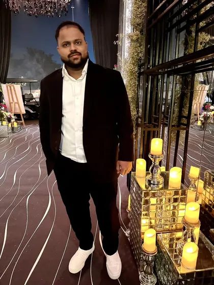 A moment away from the console at a beautifully decorated wedding venue. I always make sure to match the event's style, both in my music and my appearance.