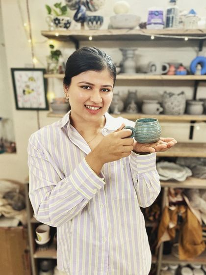 This student created a wonderful variety of forms and textures in her beginner's course, from a marbled Nerikomi bowl to a textured mug with a unique handle.