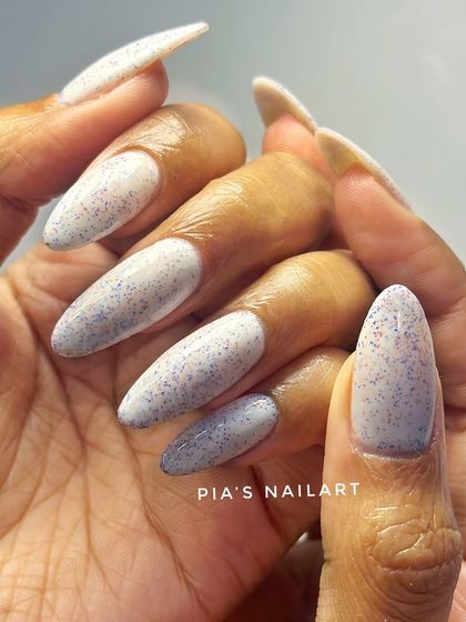 A fun "mixy" polish with multi-colored speckles, like a little party on your nails.