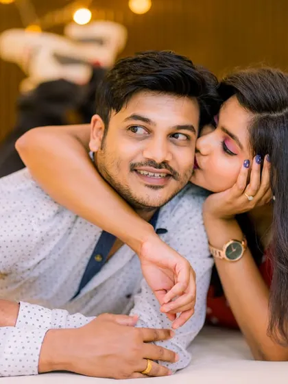 It is the simple, sweet moments that often mean the most. This close-up shot captures a gentle kiss, focusing on the raw emotion and affection that makes your pre-wedding story so special.