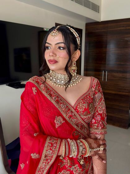 Beauty in every detail. This look features a flawless base, lifted eyes, and perfectly sculpted cheeks, finished with a sleek bun and statement accessories.