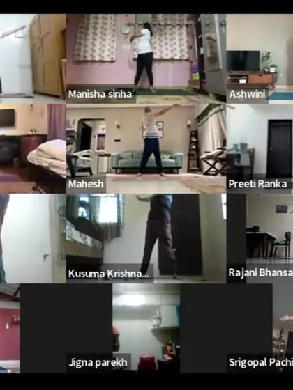 Participants engage in standing warm-up exercises during our early morning online class. These movements prepare the body for deeper postures by increasing blood flow and loosening the joints.