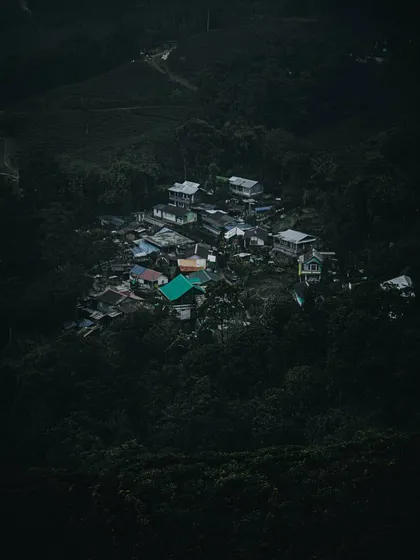 a small village nestled in a dark, green valley. this top-down perspective is similar to how i think about organizing information on a screen.