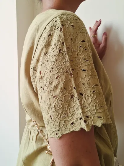 The beautiful embroidered sleeve detail on this dress adds a touch of craftsmanship and elevates it from a simple basic.