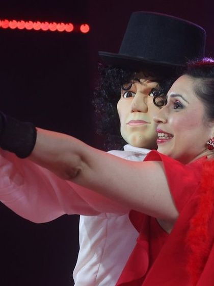 A life-sized Michael Jackson puppet taking a selfie with my wife, Aparna, on stage. We love creating puppets of famous personalities for our live shows.