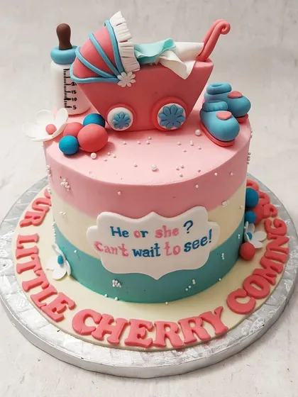 Another view of our "Little Cherry" baby shower cake, perfect for building anticipation for the new arrival.