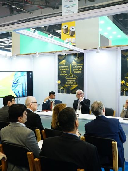 Our conference rooms are hubs for high-level meetings and strategic discussions. This image shows a focused session where international and domestic experts collaborate, a testament to the global nature of our event.