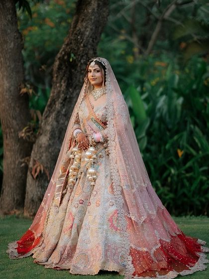 The full, breathtaking view of Khyati's bridal lehenga. She looks like royalty.