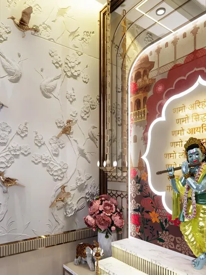 In this intimate pooja corner, every detail is crafted for spiritual focus. The placement of the Krishna idol, the use of reflective surfaces to amplify light, and the 3D wall art of flowering branches all work together to create a sacred space that radiates peace and devotion.