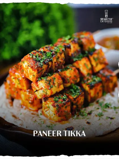 While our roots are in South India, our culinary skills know no bounds. Here is our Paneer Tikka, perfectly charred and spiced, representing the rich and diverse North Indian flavours we masterfully create.