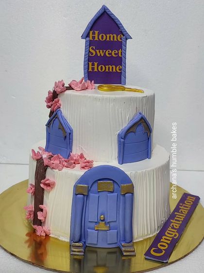 A "Home Sweet Home" cake for a housewarming, with cute fondant doors and windows.