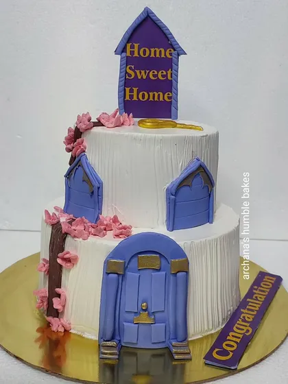 A "Home Sweet Home" cake for a housewarming, with cute fondant doors and windows.