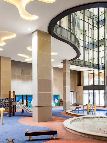 An indoor play area at Vedanya School, designed to thrive in a dense urban setting. We use clever design, multi-level structures, and natural light to create functional and engaging environments even on compact sites.