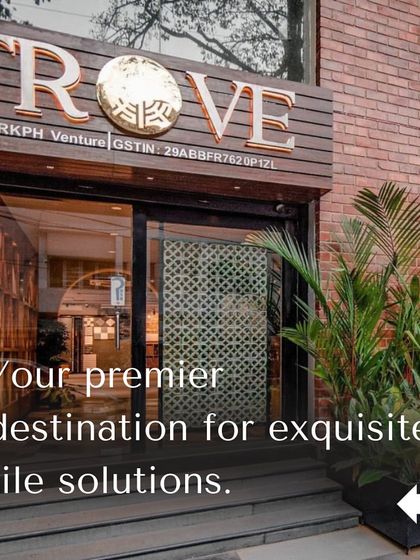 We are your premier destination for exquisite tile solutions. The exterior of our showroom, with its blend of brick, wood, and glass, reflects the quality and style you will find inside.