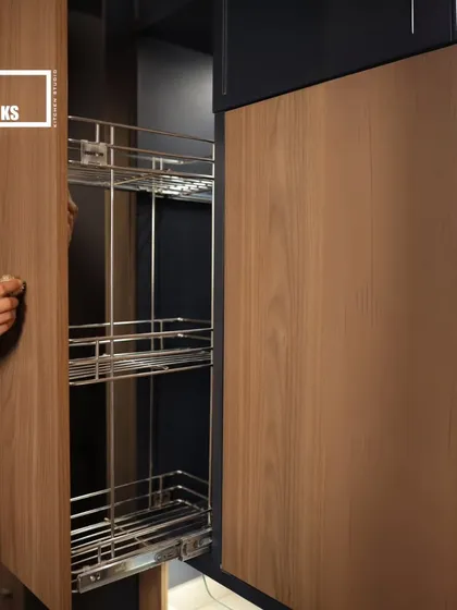 A tall pull-out pantry unit is one of the most efficient ways to store groceries. It allows you to see everything at a glance and access items easily.