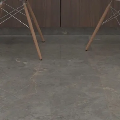 The legs of the modern chairs against the marble floor, illustrating the mix of materials.