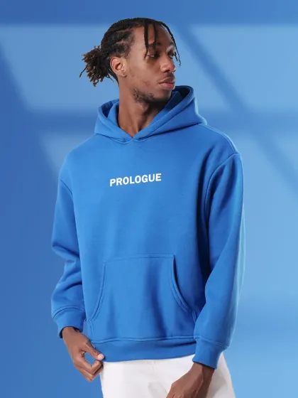 This vibrant shot of a men's hoodie against a colored backdrop shows how we make products pop. Our lighting ensures the fabric color is rich and the branding is clear, perfect for lookbooks and social media.