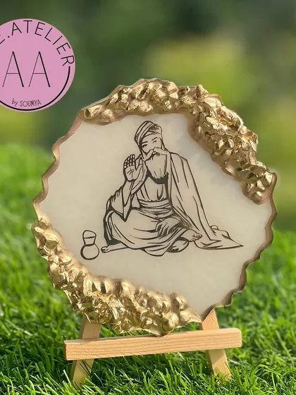 A serene Waheguruji frame in white and gold geode resin, designed as a thoughtful gift for a friend moving abroad to keep blessings close.