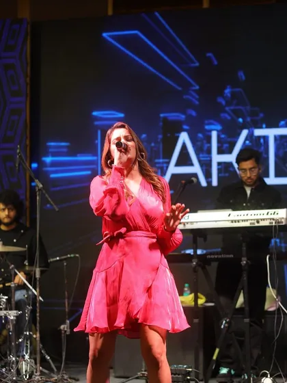 Lost in the music during a fantastic show in Chandigarh. You can see my full band setup with my keyboardist and drummer, all of us in the zone.