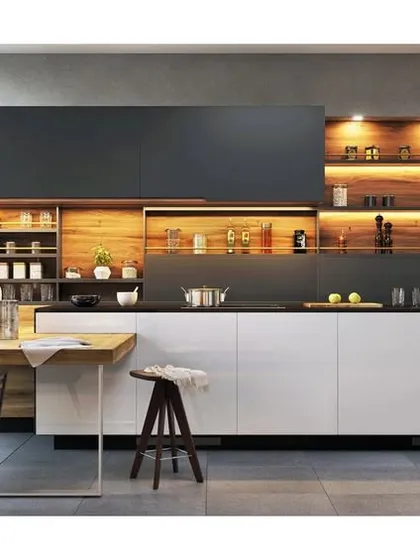 This modern modular kitchen combines sleek aesthetics with smart functionality. We used a two-tone design with handleless cabinets, integrated appliances, and strategic under-cabinet lighting to create a clean and efficient culinary workspace.