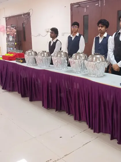 Another shot of the team at the Airoli event, showing the clean and organized buffet line they are managing.