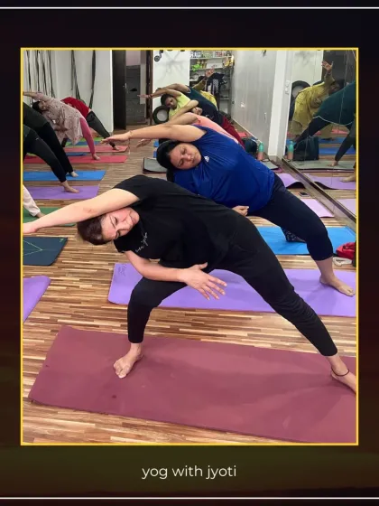 Every stretch brings strength. Students practice Utthita Parsvakonasana (Extended Side Angle Pose), which strengthens the legs and stretches the sides of the body.