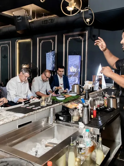 Swaroop presenting his cocktail to the judges during the prestigious bartending competition.