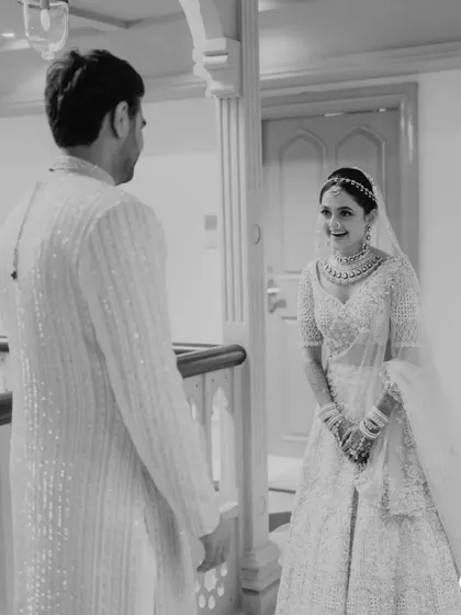 The first look. The groom's reaction upon seeing his bride is a memory that will be cherished forever.