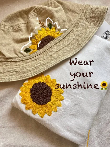 Wear your sunshine, literally! I made this matching sunflower set, a hand-embroidered t-shirt and bucket hat, for someone who wanted to gift a little bit of happiness.