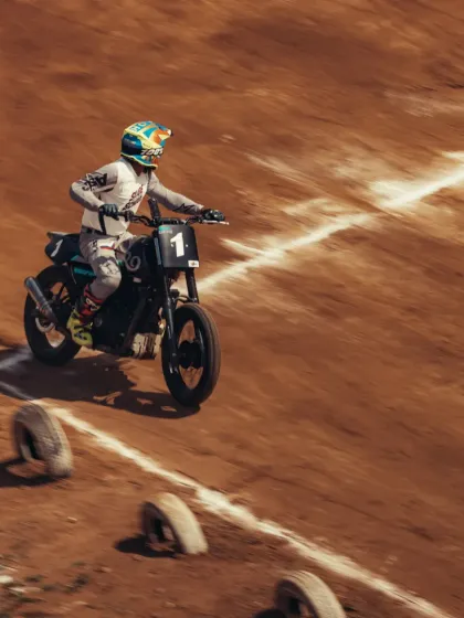 Anish Shetty crossing the finish line at the Slide School Cup, showcasing his versatility across different forms of motorsport.