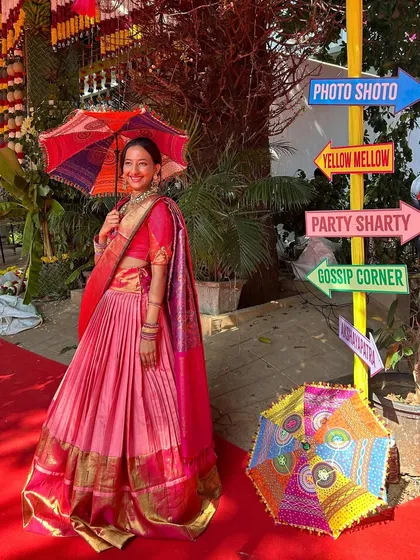 Your family's heirlooms are filled with stories, and I help you wear them. This vibrant pink Kanchi saree was transformed into a beautiful, flowing lehenga, allowing the bride to carry her heritage with her in a style that is completely her own.