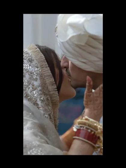 A close-up, artistic shot of a couple's almost-kiss, a moment filled with anticipation and love.