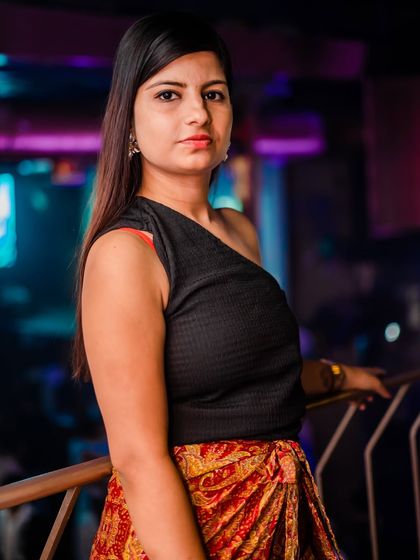 A guest enjoying the view from the upper level of the club.