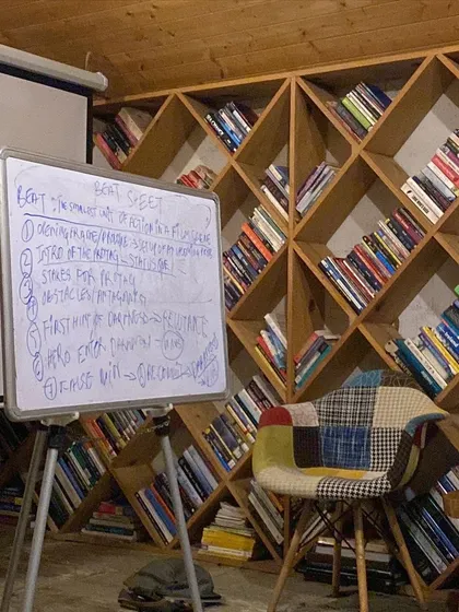 A whiteboard with a beat sheet from a screenwriting workshop. This shows the practical, hands-on approach I take to teaching the craft of storytelling.