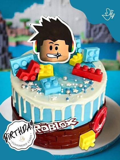A vibrant Roblox-themed cake for a young gamer. This design features a character avatar and colorful building blocks, bringing the popular online game to the birthday table.
