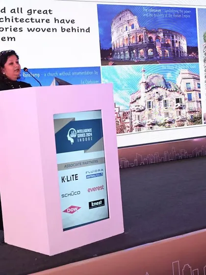 Ritu Goregaoker on stage, presenting her ideas on how great architecture, like great stories, is woven with meaning and history.