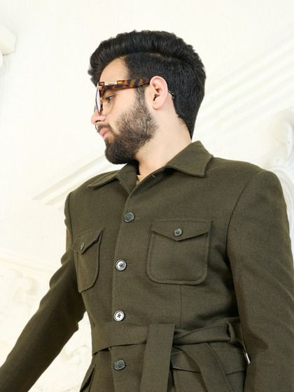 Olive green is more than a color; it’s a mood. This belted safari-style co-ord set is designed to turn heads with its unique silhouette and comfortable fabric that transitions seamlessly from day to night.