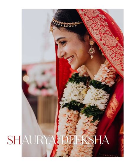 A beautiful, smiling portrait of the bride, Deeksha, during her wedding ceremony.