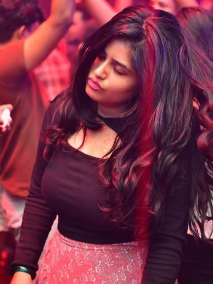 A partygoer lost in the moment at Hydra.