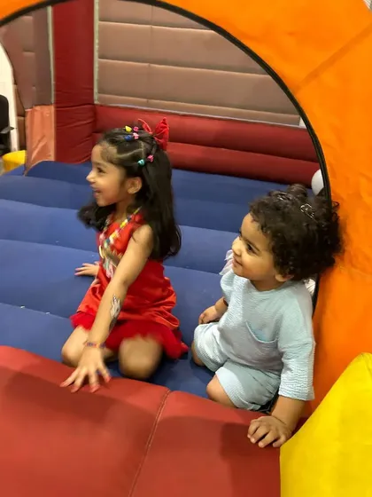 A safe and fun bouncy area where even the smallest toddlers can play. This was part of a larger kids' zone I set up for a birthday party.