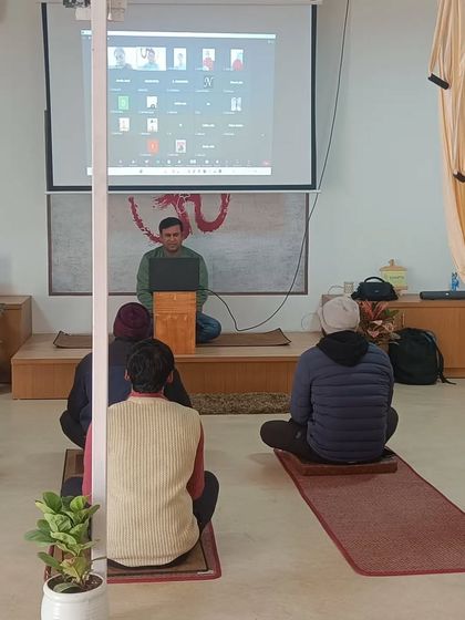 A closer look at our hybrid medical yoga workshop. I use a projector to ensure that my online students are fully integrated into the class, receiving the same level of attention as those present in the shala.