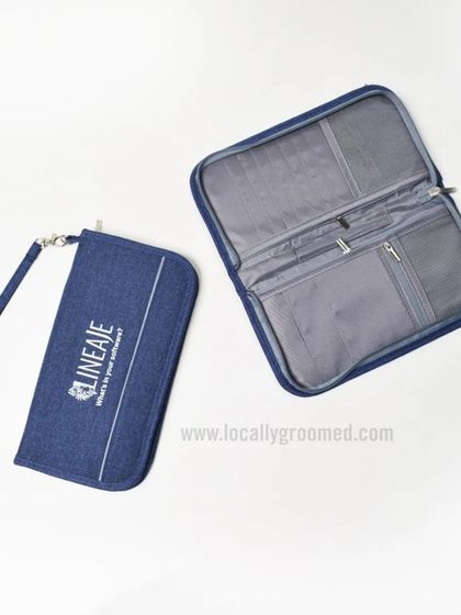 A custom travel pouch for Lineage, perfect for organizing documents and essentials. The denim-style fabric gives it a unique and modern look.