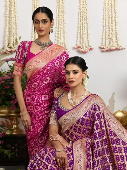 A portrait of two models in our Bandhani silk sarees, exuding grace and timeless elegance.